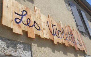 Les Violettes Sainte Eulalie Entrance Sign